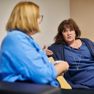 Sue Gwyn at Brynawel House speaking with Regional Manager, Rachel Marshall