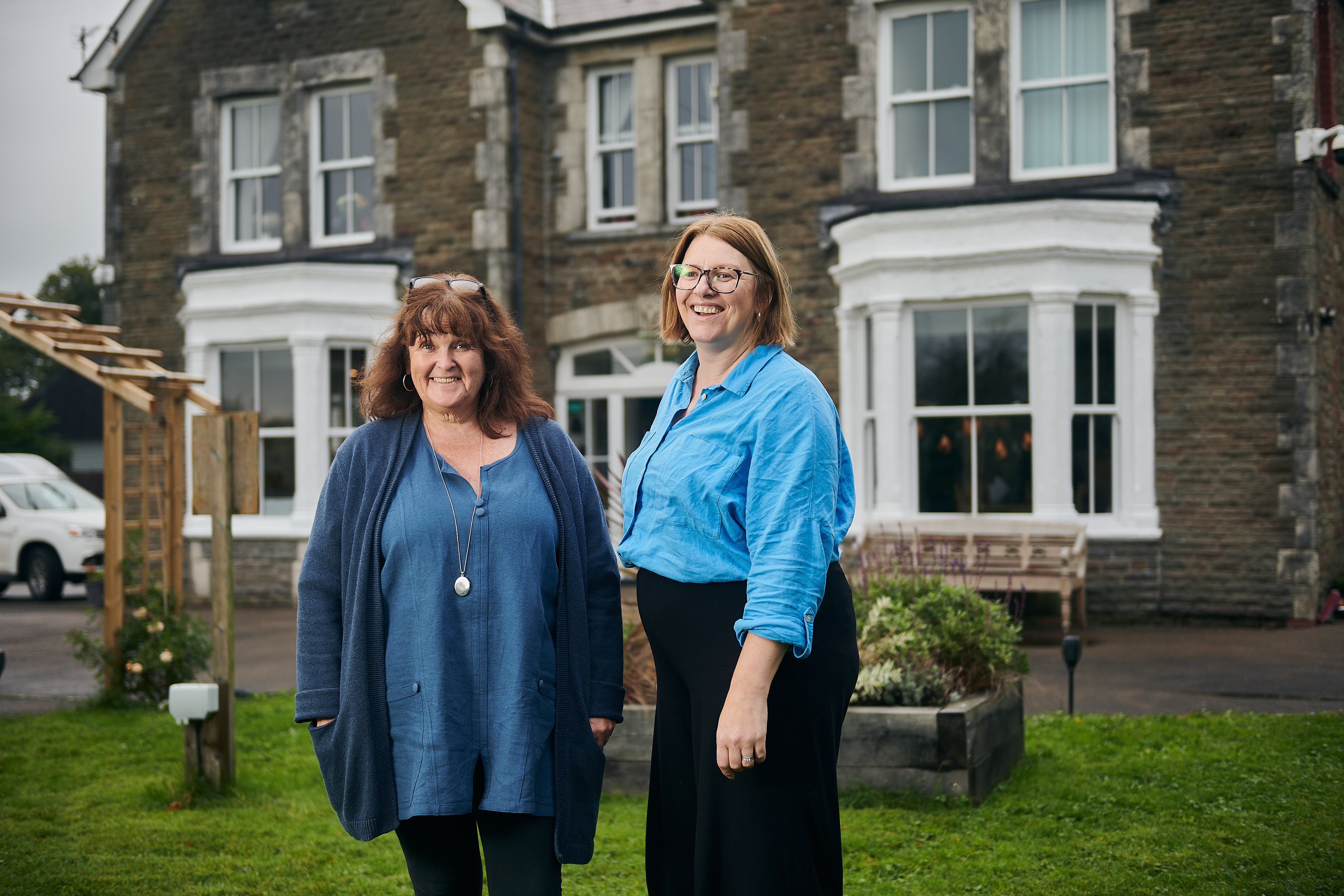 Sue Gwyn and Rachel Marshall stand outside Brynawel House